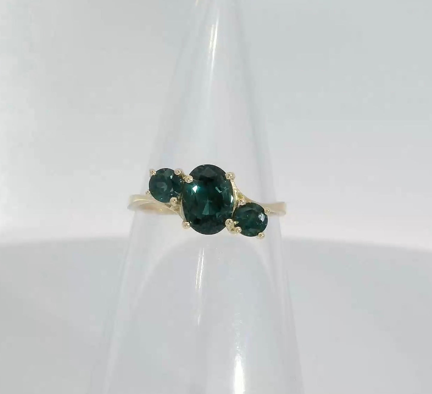 Elegant 14ct Gold Ring set with Teal Sapphires. M14004