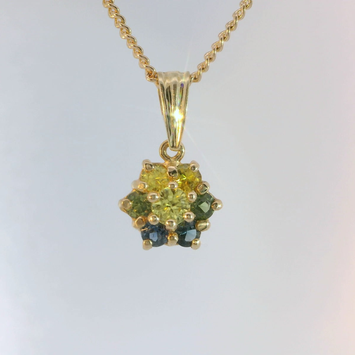 Multi Coloured Sapphires set into a 9ct Pendant M92104