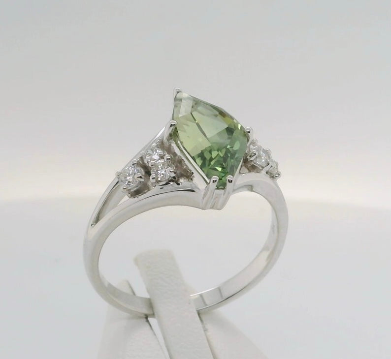 Beautiful Australian Sapphire set with Diamonds in a 9ct White Gold Ring. M92138