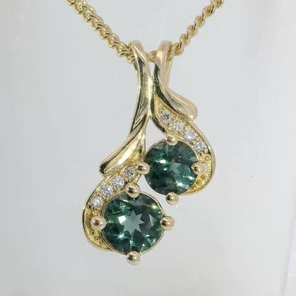Exquisite 9ct Gold Pendant set with Teal Sapphires & Diamonds. M92195
