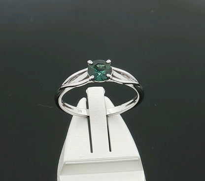 Teal Sapphire set in a 9ct White Gold Ring. M91818