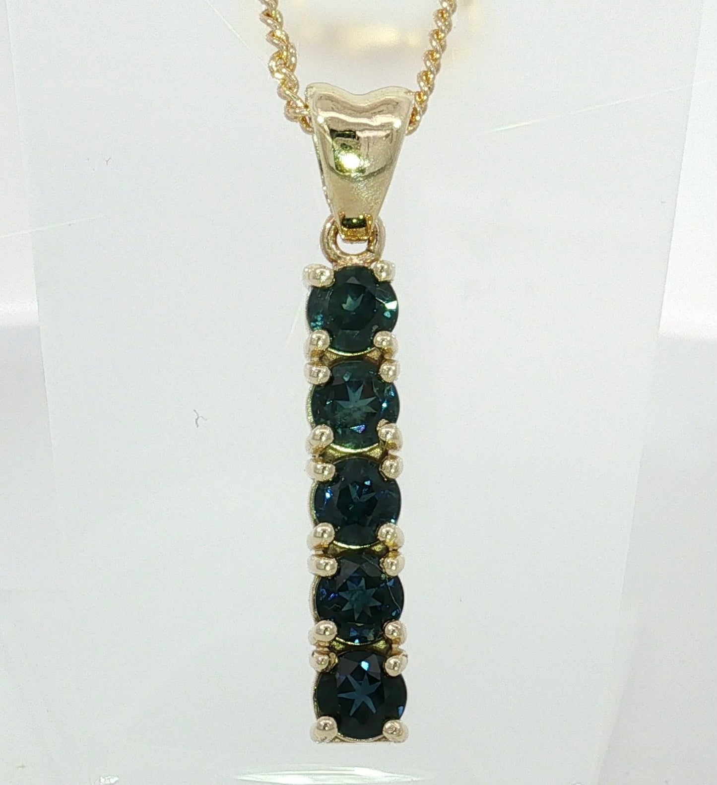Bright Blue Sapphire Vertical Bar Pendant in 9ct Yellow Gold M92077