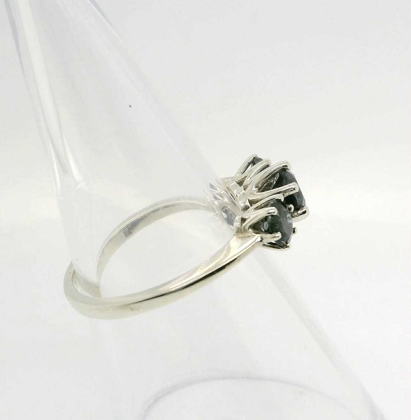 Trilogy of Dazzling Blue Sapphires set in a White Gold Ring. M92134