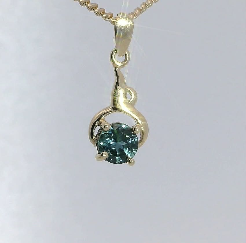 Teal Sapphire 9ct Gold Pendant. M92159