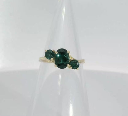 Elegant 14ct Gold Ring set with Teal Sapphires. M14004