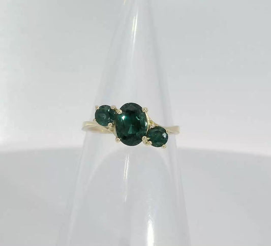 Elegant 14ct Gold Ring set with Teal Sapphires. M14004