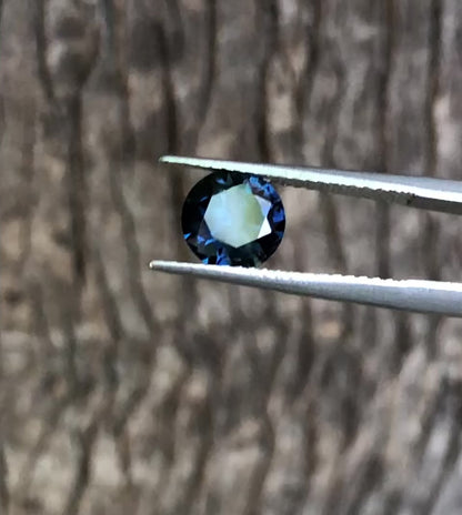 Bright Blue with a Light Green Flash Australian Sapphire. M1075