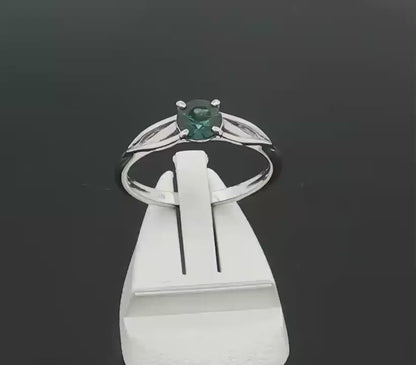 Teal Sapphire set in a 9ct White Gold Ring. M91818