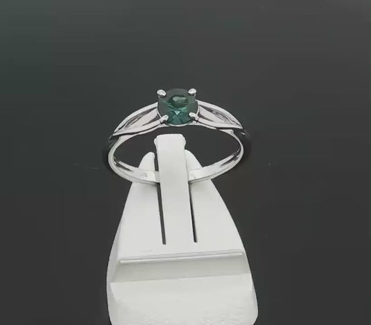 Teal Sapphire set in a 9ct White Gold Ring. M91818