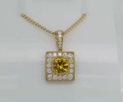 Elegant Pendant set with a Golden Yellow Sapphire & Diamonds. M92034