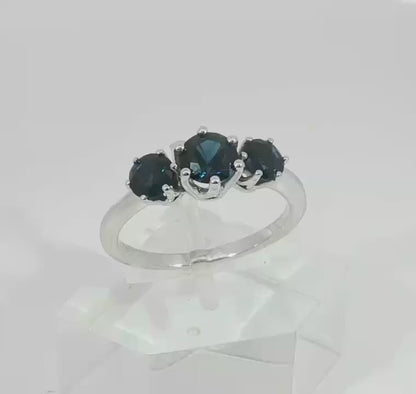 Trilogy of Dazzling Blue Sapphires set in a White Gold Ring. M92134