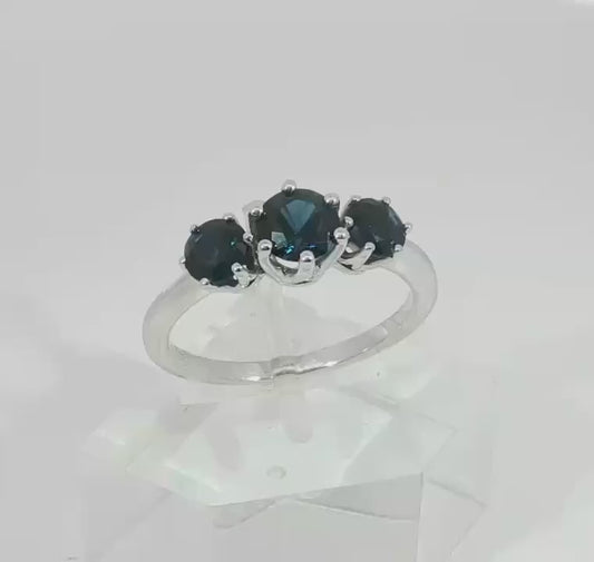 Trilogy of Dazzling Blue Sapphires set in a White Gold Ring. M92134