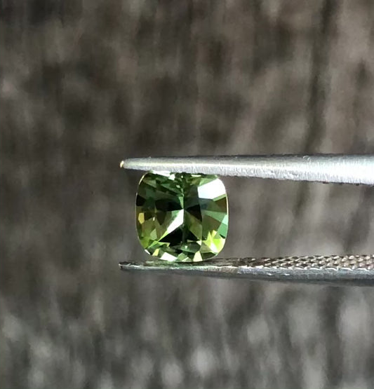 Green with Yellow Highlights Cushion Cut Sapphire. M1225