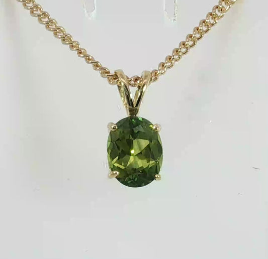 9ct Gold Pendant set with a Bright Green Sapphire. M92254