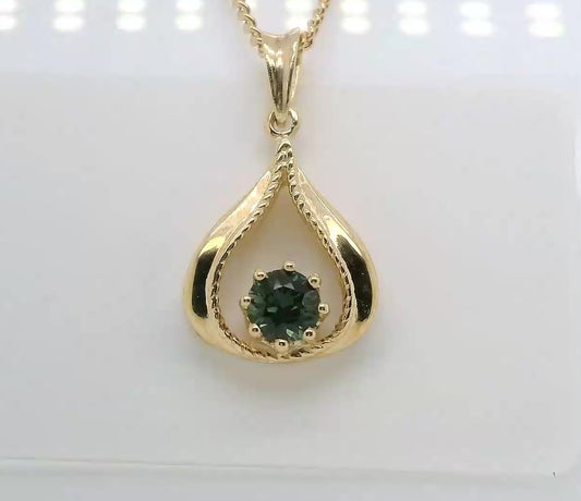 Elegant Pendant set with a Green Australian Sapphire. M92128